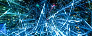 Banner für Blogbeitrag zum Thema Sonderupdate KI zeigt ein Netzwerk aus Datenleitungen